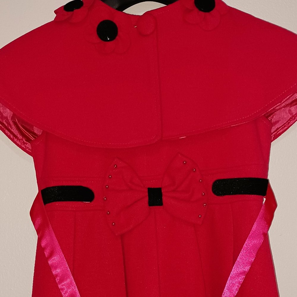 Girls Winter Dress with over the shoulders capelet.